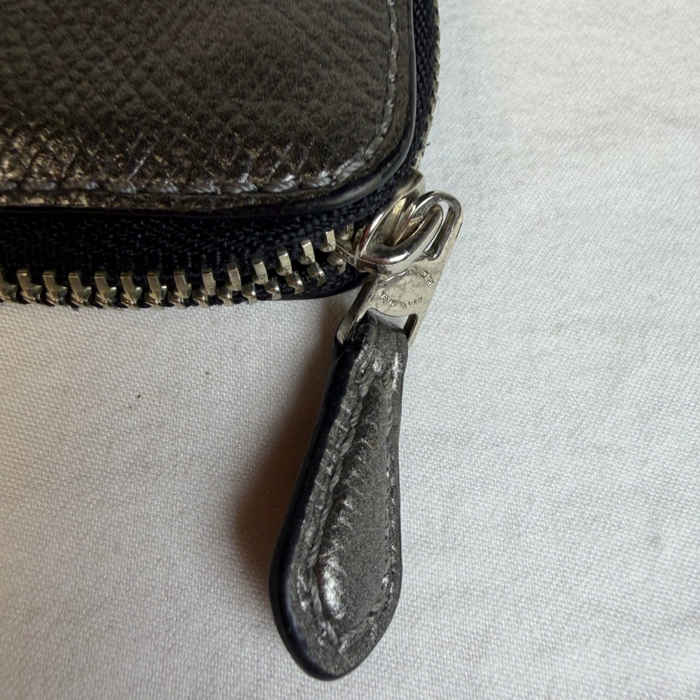 COACH Silver Pewter  Metallic Leather Zipper Wallet Wristlet
$199 
Authentic - Picture 7 of 11